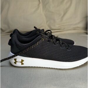 Under armor sneakers. Women’s size 9. Never worn